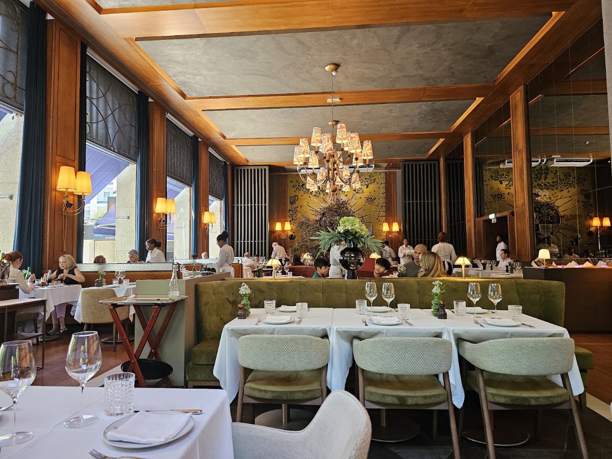 Waiters serving guests in the elegant dining room